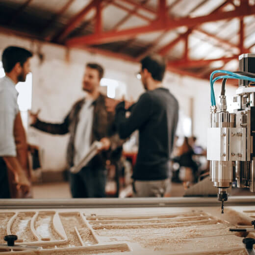 Three employees in warehouse