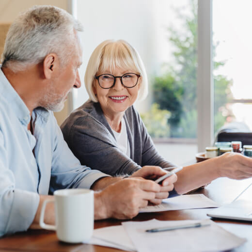 Mature couple doing paperwork